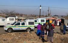 Police at the scene of mass shooting in Soweto on 10 July 2022. 