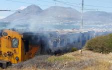 A Metrorail train caught fire in Fish Hoek on Thursday 21 January 2015. Picture: Russel Human.