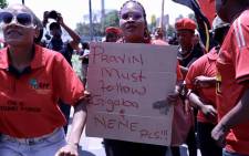 EFF members picket outside the state capture commission of inquiry on 19 November 2018, where Public Enterprises Minister Pravin Gordhan was giving evidence. Picture: Abigail Javier/EWN