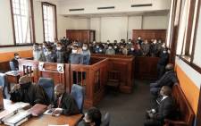 50 suspects appeared in the Johannesburg Central Magistrates Court on 21 July 2021 on various charges including public violence, housebreaking and theft following days of violence and looting in Gauteng. Their case was postponed to 28 July 2021. Picture: Boikhutso Ntsoko/Eyewitness News.