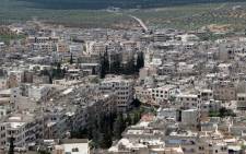 A picture taken on 29 May 2015 from the top of a hill shows a general view of the town of Ariha, in the northwestern province of Idlib, a day after the city was seized by a rebel coalition led by al-Qaeda’s Syria franchise. Picture: AFP.