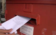A letter being posted at the Benmore Gardens in November 2014. Picture: Reinart Toerien/EWN.