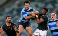 French Barbarians Arthur Bonneval (2nd-L) vies for the ball with South Africa's Warrick Gelant (2nd-R) during the rugby union test match between French Barbarians and South Africa on June 16, 2017, in Durban. Picture: AFP.