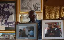 Former photojournalist Sam Nzima sharing some of his memorable moments in his home studio in Bushbuckridge, Mpumalanga. Picture: EWN.