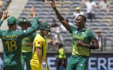 FILE: South Africa's Lungi Ngidi (R) celebrates after taking the wicket of Australia's Aaron Finch (C) during the first one-day international (ODI) cricket match between South Africa and Australia at the Optus Perth stadium in Perth on 4 November 2018. Picture: AFP