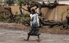 A mother and her baby leave the Central Hospital of Beira after Cyclone Idai swept through the city. Picture: Christa Eybers/EWN.