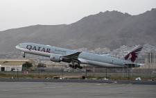A Qatar Airways aircraft takes off from the airport in Kabul on 9 September 2021. Some 200 passengers, including US citizens, left Kabul airport on on the first flight carrying foreigners out of the Afghan capital since a US-led evacuation ended on 30 August. Picture: Wakil Kohsar/AFP