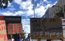 Learners holding placards outside the Western Cape Legislature demanding better safety measures. Picture: @equal_education/Twitter