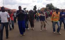FILE: Angry residents in Bekkersdal protest against poor service delivery on 23 October 2013. Picture: Sebabatso Mosamo/EWN.