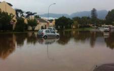Flooding in Somerset West has left cars stranded after heavy rains on 15 November 2013. Picture: Chanel September/EWN.