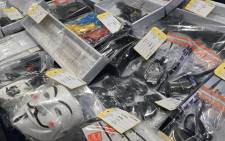 Seized items are seen on display at the Hong Kong police headquarters on July 6, 2021, after nine Hong Kongers - six of them secondary school children - were arrested on terror charges for allegedly trying to manufacture a powerful explosive, police announced. Picture: Peter Parks / AFP