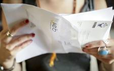 FILE: A matric pupil from checks the results from her IEB Matric exams. Picture: Thomas Holder/EWN