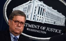 FILE: US Attorney General William Barr holds a press conference regarding the December 2019 shooting at the Pensacola Naval air station in Florida at the Department of Justice in Washington, DC. Picture: AFP