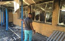 Students allegedly set buildings alight at the Vaal University of Technology’s Vanderbijlpark campus on 11 May 2016. Picture: Kgothatso Mokgale/EWN.
