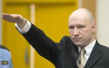 FILE: Norwegian mass killer Anders Behring Breivik makes a Nazi salute as he arrives to a makeshift court in Skien prisons gym on 15 March, 2016 in Skien, some 130 km south west of Oslo, for his lawsuit against the Norwegian state, which he accuses of violating his human rights by holding him in isolation. Picture: AFP.