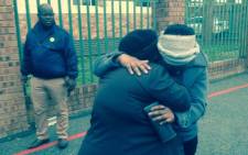FILE: Zamokuhle Mbatha's mother being comforted after his court appearance on 11 November 2014. Picture: Thando Kubheka/EWN