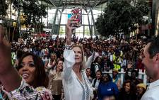 Katherine Lang who plays Brooke Logan in 'The Bold and The Beautiful' snaps a selfie with fans at Maponya Mall. Picture: Lungelo Matangira/EWN