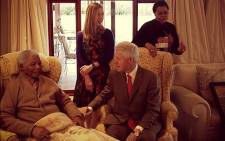 Former US President Bill Clinton and his daughter Chelsea meet Nelson Mandela and his wife Graca Machel in Qunu. Picture: Mbuso Mandela via Twitter