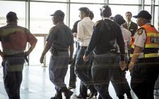 British businessman Shrien Dewani leaves Cape Town International Airport for the UK on 9 December 2014. Picture: Thomas Holder/EWN.