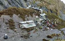 The wreckage of a Twin Otter aircraft, operated by Nepali carrier Tara Air, lay on a mountainside in Mustang on May 30, 2022, a day after it crashed. Picture: Bishal Magar / AFP