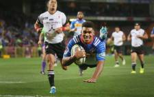Stormers flyhalf Damian Willemse dives over to score a try during the Stormers Super Rugby match at Newlands. The Stormers beat the Sunwolves 52-15 in their last home game of the season. Picture: Bertram Malgas