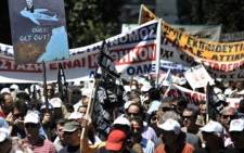 Demonstrators march in central Athens on May 4, 2010. Picture: AFP