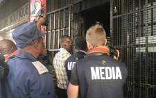 FILE: A scuffle broke out after journalists were invited to come into the MDC Alliance headquarters in Harare where police were conducting a search operation during the 2018 elections. Picture: Masechaba Sefularo/Eyewitness News.