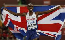 Britain’s Mo Farah celebrates winning the final of the men’s 5000 metres athletics event at the 2015 IAAF World Championships at the “Bird’s Nest” National Stadium in Beijing on 29 August, 2015. Picture: AFP.
