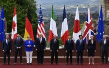 FILE: Leaders pose for a photo during the Summit of the Heads of State and of Government of the G7 plus the European Union on 26 May 2017 in Taormina, Sicily. Picture: AFP.