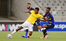 Mamelodi Sundowns' Themba Zwane holds off two Cape Town City FC players during their DStv Premiership match in Cape Town on 4 November 2020. Picture: @Masandawana/Twitter