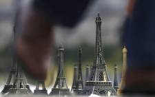 FILE: A picture shows miniature Eiffel Towers in Paris, on November 16, 2017. Picture: AFP.