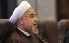 Iran’s President Hassan Rouhani says if Iraq’s government asks, they will help end the insurgency. Picture: AFP.