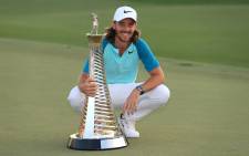 Tommy Fleetwood with the Race to Dubai trophy. Picture: @EuropeanTour/Twitter