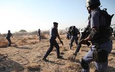 FILE: Police open fire at protesting workers at the Lonmin mine in Marikana, North West on 16 August, 2012. Picture: Taurai Maduna/Eyewitness News