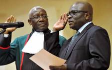 Minister of Mineral Resources Ngoako Ramatlhodi (R) is seen being sworn in as a deputy minister in 2010. Picture: GCIS.