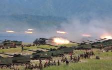 This undated photo released by North Korea's official Korean Central News Agency (KCNA) on 26 August, 2017 shows rockets being launched by Korean People's Army (KPA) personnel during a target strike exercise at an undisclosed location in North Korea. Picture: AFP