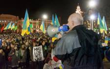 FILE: A Pro-Ukrainian activist speaks during a rally in the center of the eastern Ukrainian city of Kharkiv on 6 March2014, to protest against Russian aggression in Crimea. Picture: AFP.