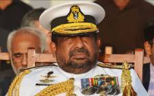 This photo taken on 29 August 2018 shows a Sri Lankan Admiral Ravindra Wijegunaratne, Chief of the Defence Staff attends a ceremony commissioning two naval patrol boats Japan gifted the Sri Lankan coastguard, in Colombo. A court on August 29 ordered the arrest of Sri Lanka's top military officer in connection with the abduction and murder of 11 people during the island's civil war. Colombo Fort magistrate Lanka Jayaratne directed police to detain Admiral Ravindra Wijegunaratne, Chief of the Defence Staff, for allegedly helping the main person accused in the killings escape prosecution. Picture: AFP