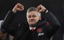 Manchester United caretaker boss Ole Gunnar Solskjaer celebrates his side's victory at Cardiff City. Picture:  @ManUtd/Twitter.