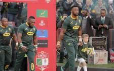 FILE: Captain Siya Kolisi leads the Springboks out. Picture: AFP