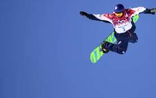 RUSSIAN FEDERATION, Rosa Khutor : Great Britain's Billy Morgan competes during the Men's Snowboard Slopestyle Final at the Rosa Khutor Extreme Park during the Sochi Winter Olympics on February 8, 2014. Picture: AFP.