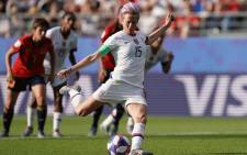 United States' forward Megan Rapinoe scores a goal during the France 2019 Women's World Cup round of sixteen football match between Spain and USA, on 24 June, 2019, at the Auguste-Delaune stadium in Reims, northern France. Picture: AFP.