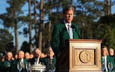 FILE: Fred Ridley, chairman of Augusta National Golf Club, speaks during the green jacket ceremony as Patrick Reed of the United States looks on after winning the 2018 Masters Tournament at Augusta National Golf Club on April 8, 2018 in Augusta, Georgia. Picture: AFP
