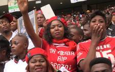 Orlando Pirates supporters cry during the funeral service of Senzo Meyiwa at the Moses Mabhida Stadium in Durban, Saturday 1 November 2014. Picture: Vumani Mkhize/EWN.