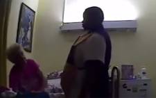 Ncediswa Mkenkcele was arrested in March after she was secretly filmed beating up 84-year-old Hope Shepard at the Lily Kirchmann Complex in East London. Picture: Screengrab.
