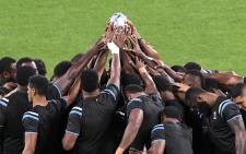 Fiji players pray at the start of the team's Captain's Run in Sapporo on 20 September 2019, ahead of the Japan 2019 Rugby World Cup. Picture: AFP