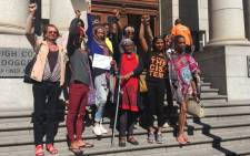 Activists gathered in support of transgender inmate Jade September, who won a case against the Department of Justice and Correctional Services after she was  sent to a correctional facility for men. Picture: Jarita Kassen/EWN.