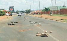 Protestors in Randfontein have blockaded roads with rocks and garbage. Picture: Masego Rahlaga/EWN.
