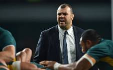 Australia's coach Michael Cheika watches his players warm up ahead of the Rugby Championship International test match between Argentina and Australia at Twickenham stadium in south west London on 8 October 2016. Picture: AFP.