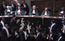 Justice Edwin Cameron applauded in the Constitutional Court where he was celebrated for his contributions to the South African justice system. Cameron has retired after 25 years. Picture: Abigail Javier/EWN